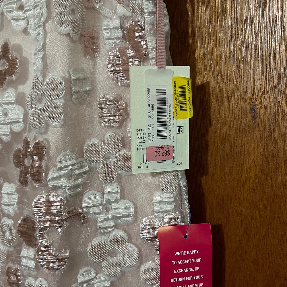 NWT.  Feather fun! Pink champagne cocktail dress.
